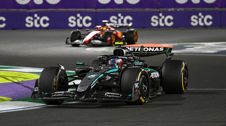 Andrea Kimi Antonelli of Italy driving the (12) Mercedes AMG Petronas F1 Team W16 leads Lewis Hamilton of Great Britain driving the (44) Scuderia Ferrari SF-25 on track during the F1 Grand Prix of Saudi Arabia at Jeddah Corniche Circuit on April 20, 2025 in Jeddah, Saudi Arabia.