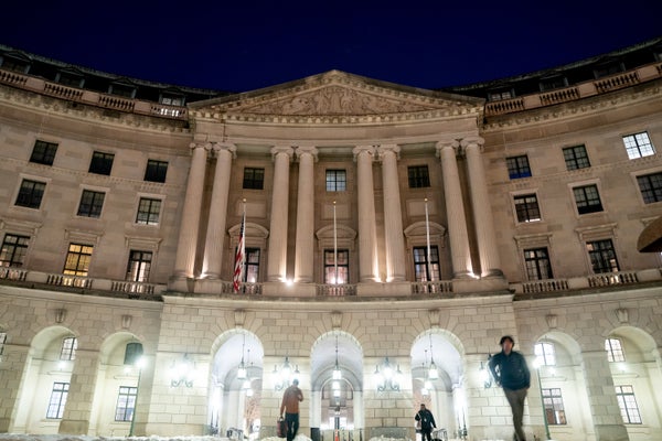 A large columned gray building
